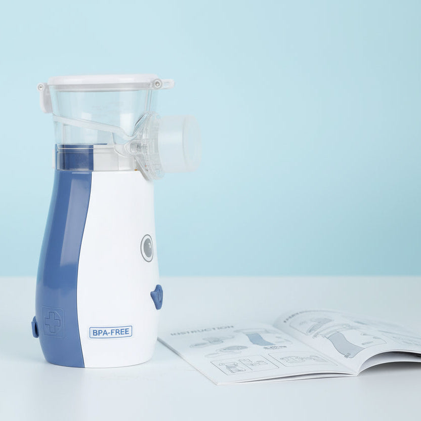 Mericonn UN209 blue and white penguin mesh nebulizer side view